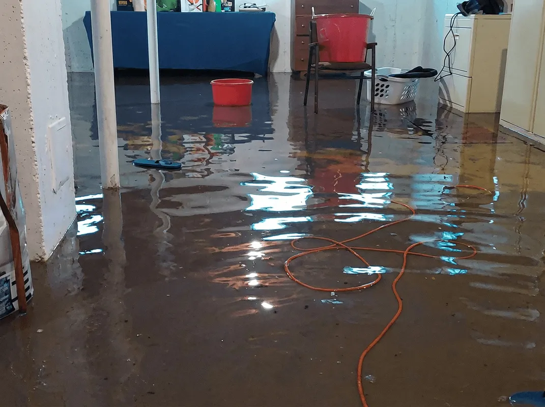 Basement with boiler, cabinets and washing machine completely flooded in Raleigh, NC
